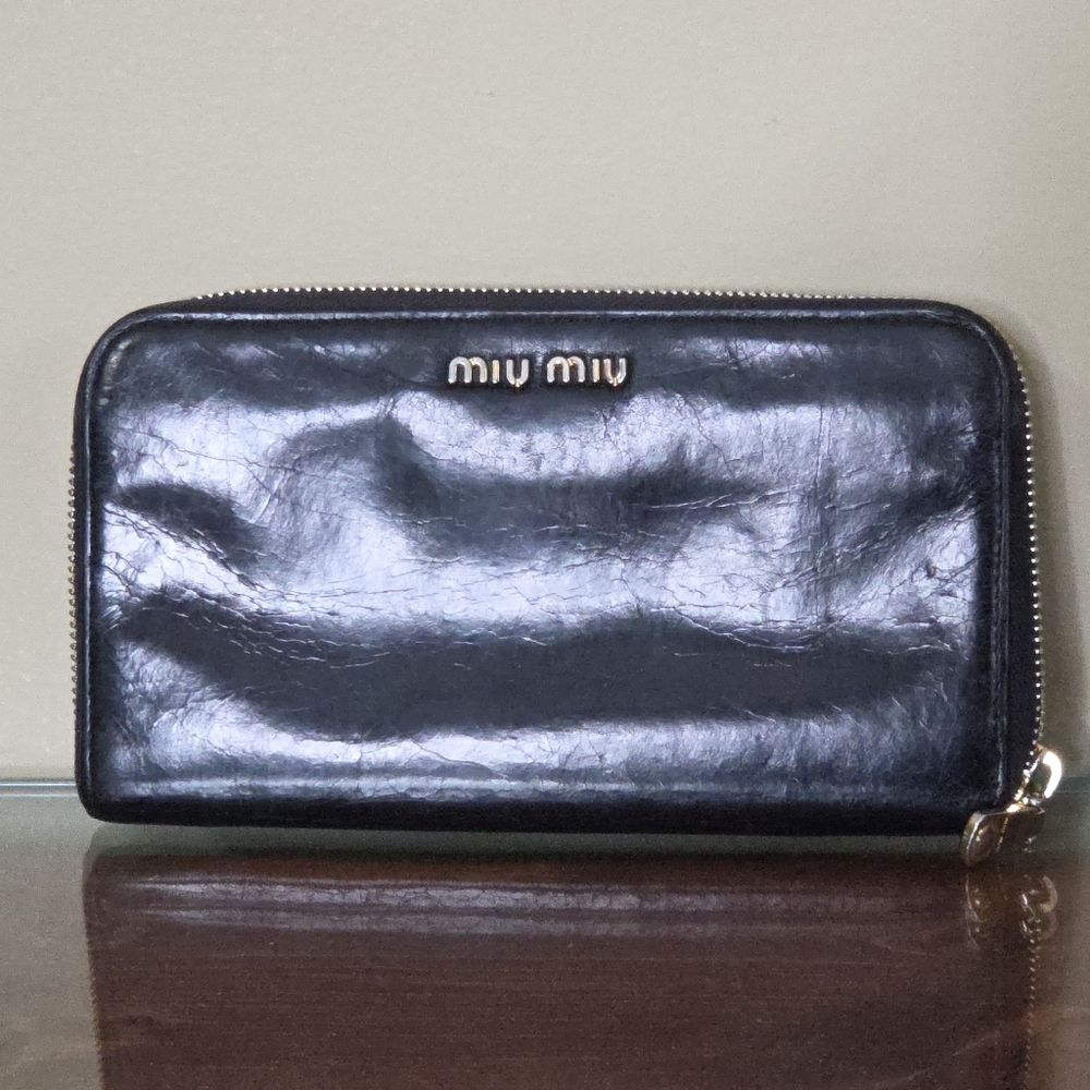 Authentic Miu Miu  Black Zip Around Patent Leather Wallet